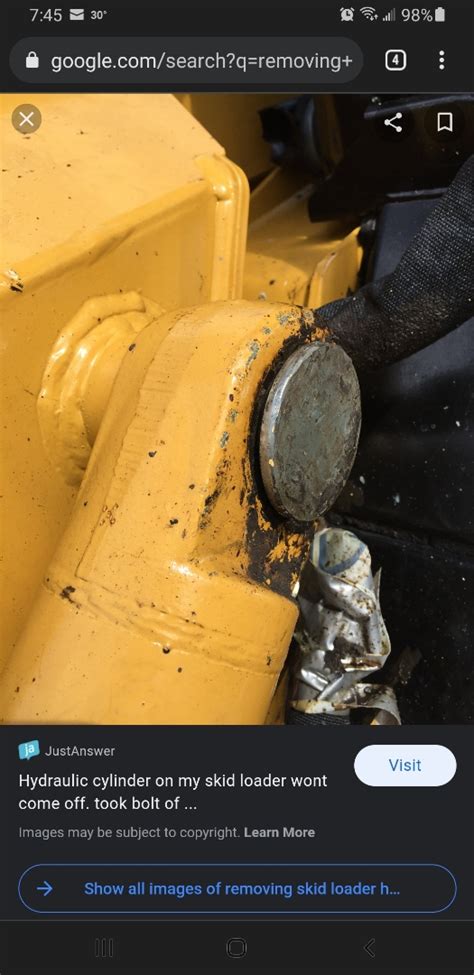 how to remove bucket from john deere skid steer|john deere heavy duty bucket.